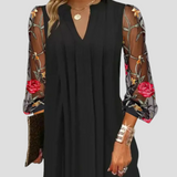 Natalia - Elegante minivestido con mangas transparentes