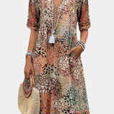 Perla Vestido Boho con Estampado Floral y Detalles en Crochet