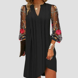 Natalia - Elegante minivestido con mangas transparentes